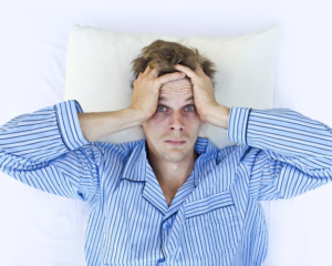 man unable to sleep