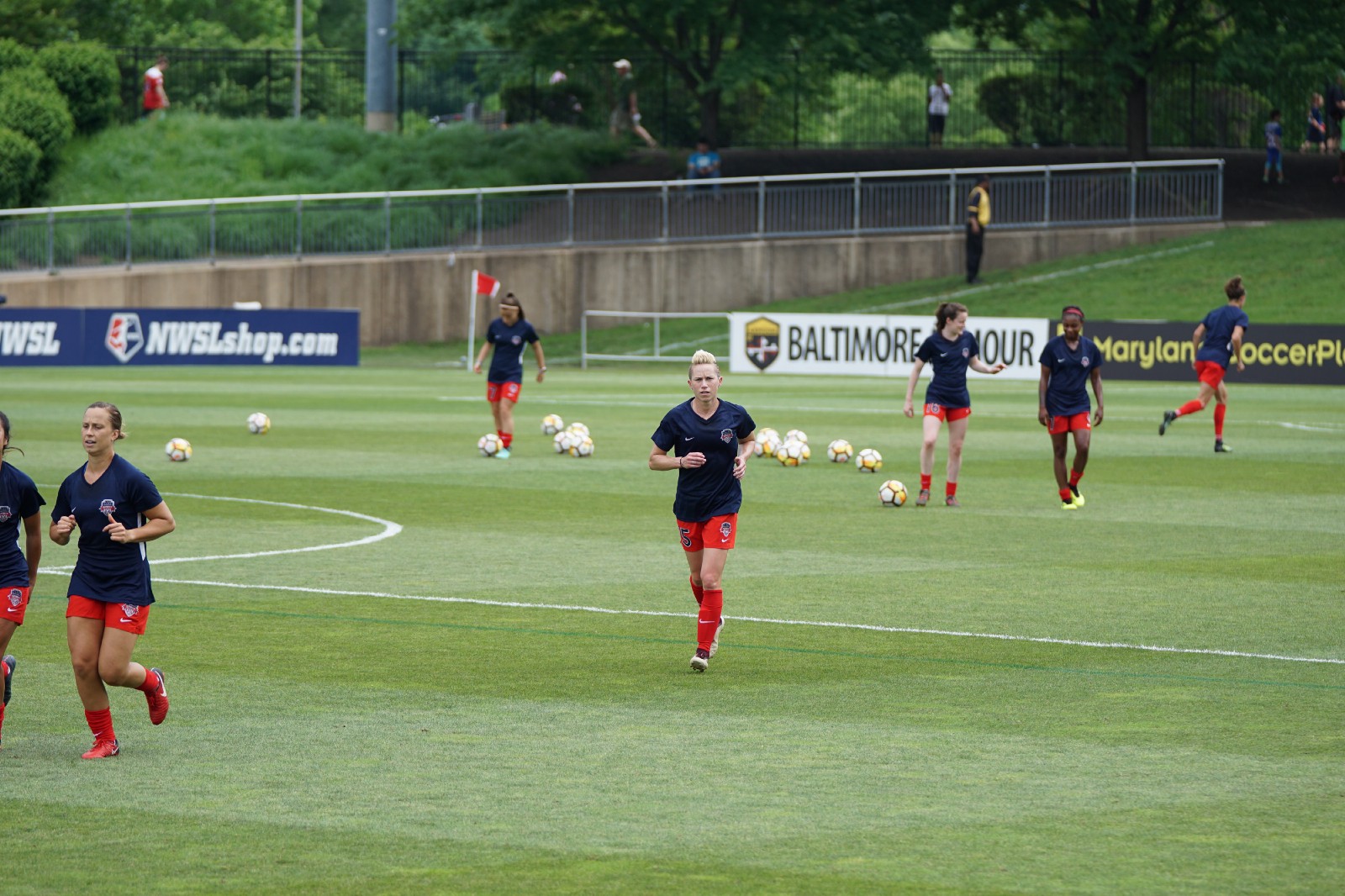 female soccer players warming up